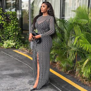 Split Sheath Skirt With A High Neck Sheer Long Sleeves And Dress